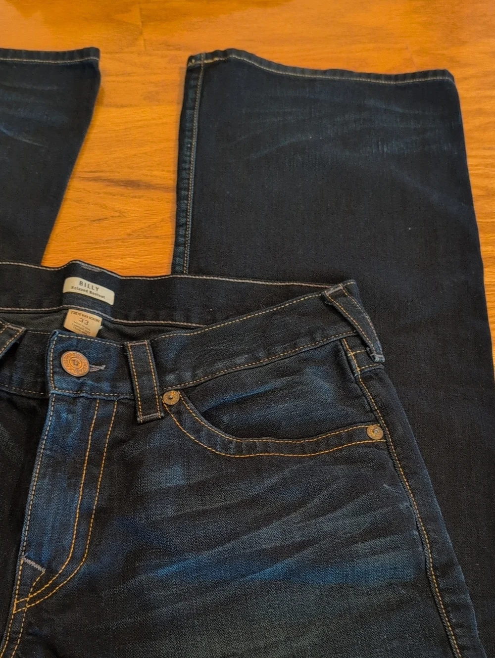 True Religion men's Dark Blue Bootcut Jeans with Signature Pocket Flap
